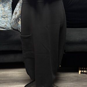 Black Midi Skirt with Pocket and bottom drawstring.